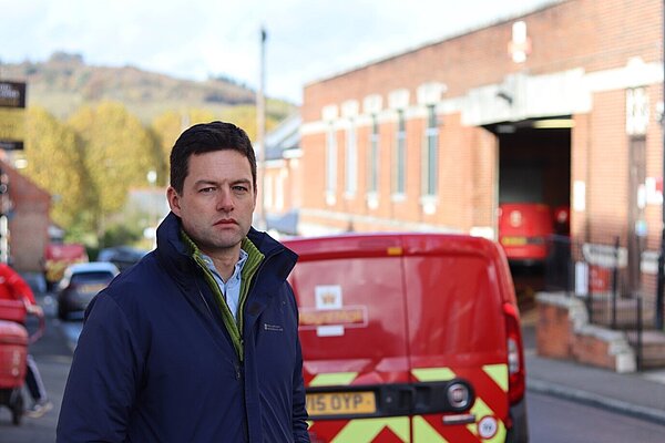 Chris Coghlan outside Royal Mail sorting office in Dorking