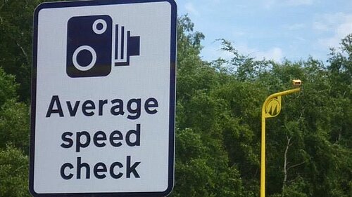 Sign saying 'Average speed check' 